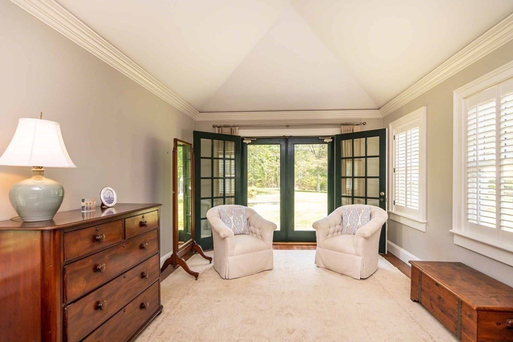 23 Indian Hollow Road West Tisbury, MA 02568 - Photo 25 of 42 a living room with furniture and a large window