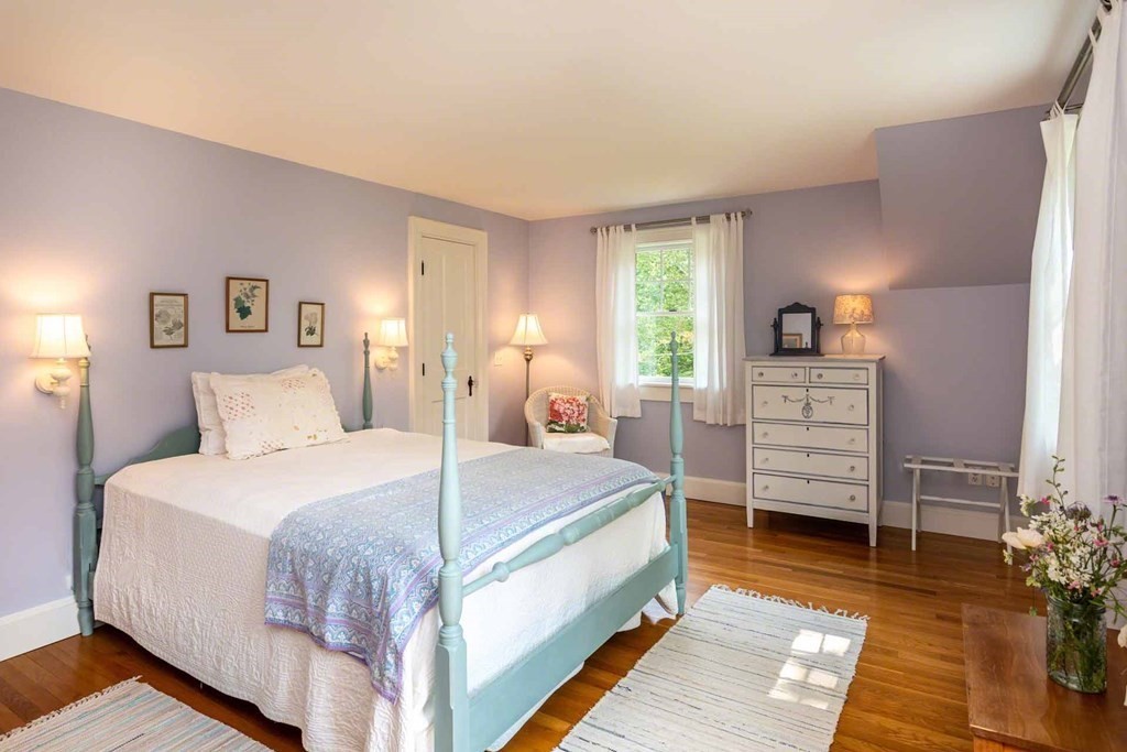 23 Indian Hollow Road West Tisbury, MA 02568 - Photo 29 of 42 a large bedroom with a bed and furniture