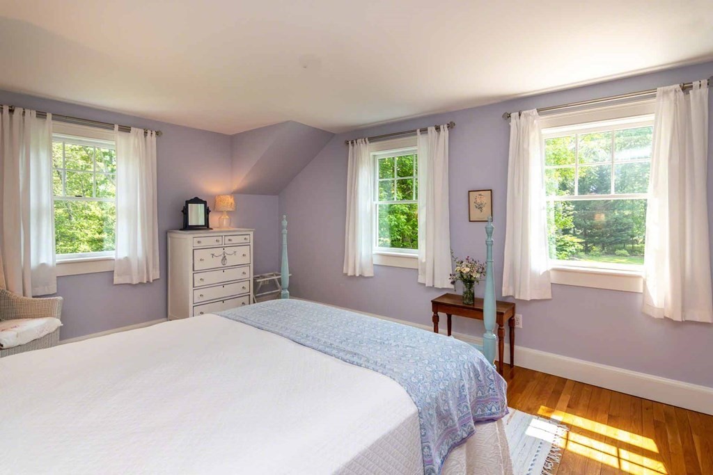 23 Indian Hollow Road West Tisbury, MA 02568 - Photo 30 of 42 a bedroom with a bed and a window