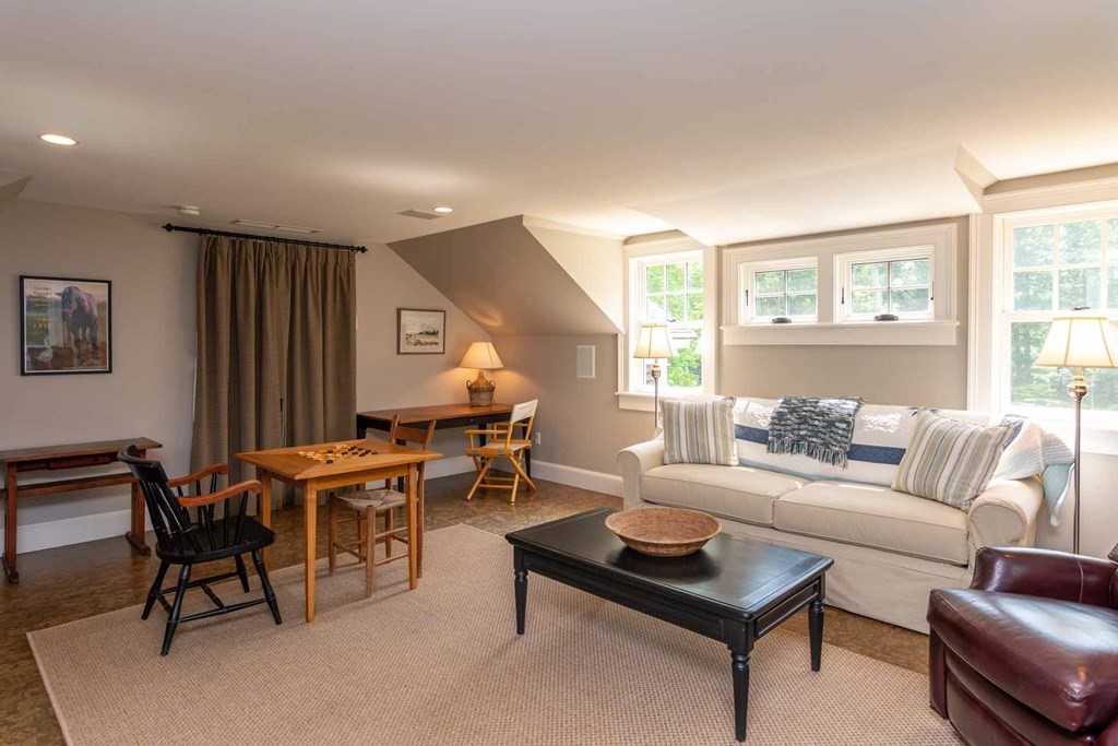 23 Indian Hollow Road West Tisbury, MA 02568 - Photo 35 of 42 a living room with furniture and a large window