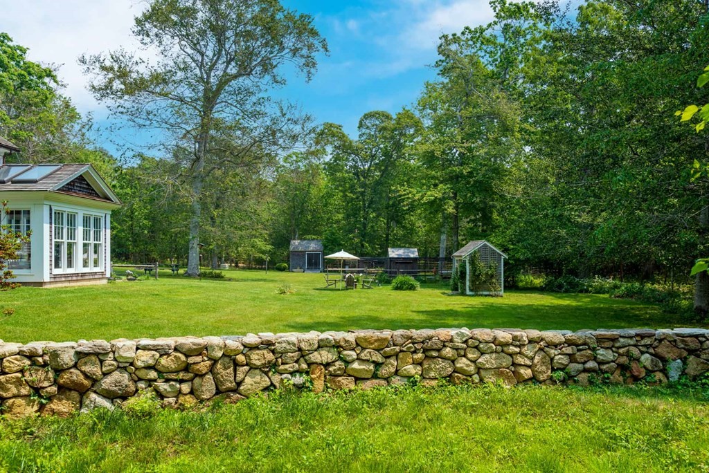 23 Indian Hollow Road West Tisbury, MA 02568 - Photo 38 of 42 a view of a house and a yard