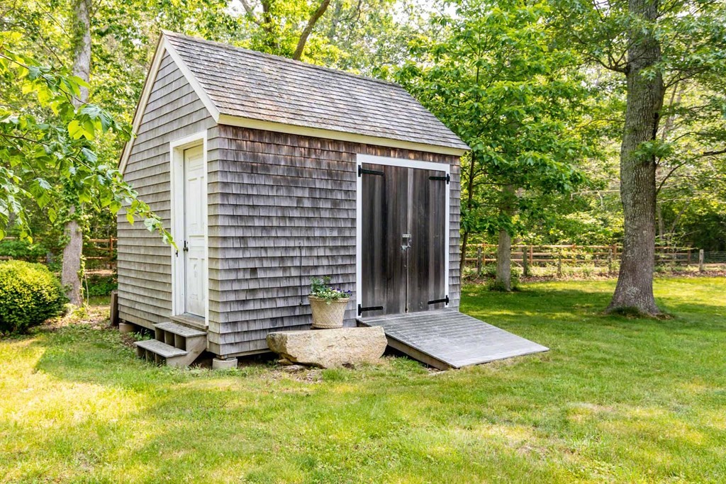 23 Indian Hollow Road West Tisbury, MA 02568 - Photo 39 of 42 a view of backyard with a garden and entertaining space