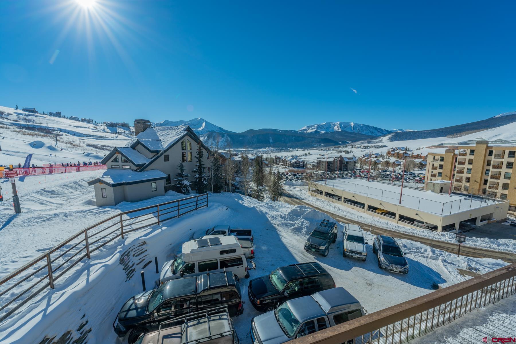 14 Snowmass Road, Unit 301 Crested Butte, CO 81225 - Photo 27 of 35 a view of a balcony with chairs