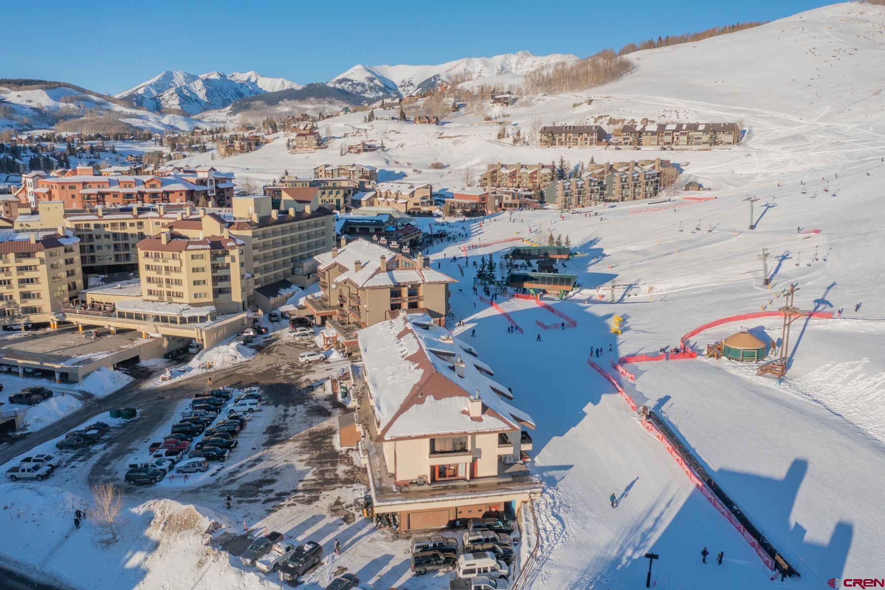 14 Snowmass Road, Unit 301 Crested Butte, CO 81225 - Photo 31 of 35 an aerial view of a house with a mountain view
