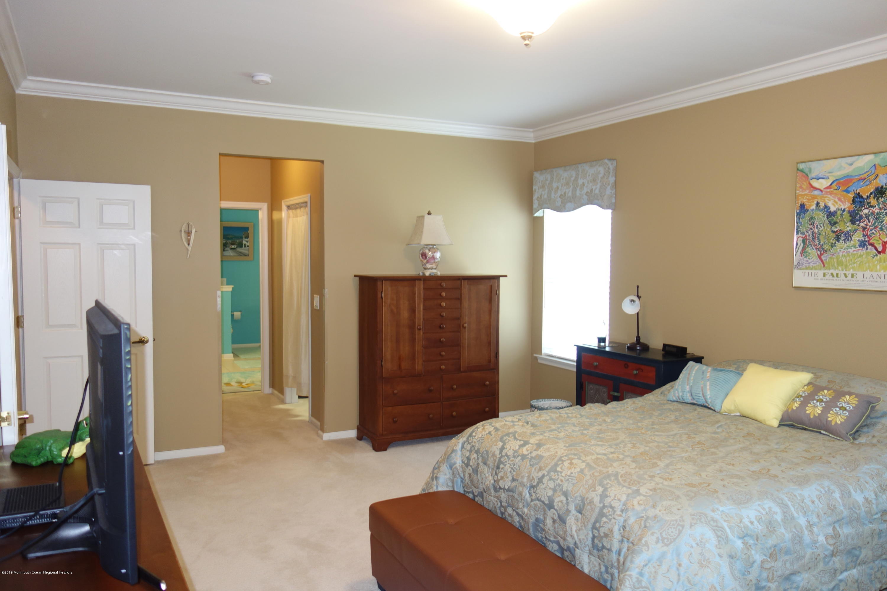 33 Pancoast Road Waretown, NJ 08758 - Photo 15 of 27 a bedroom with a bed and furniture