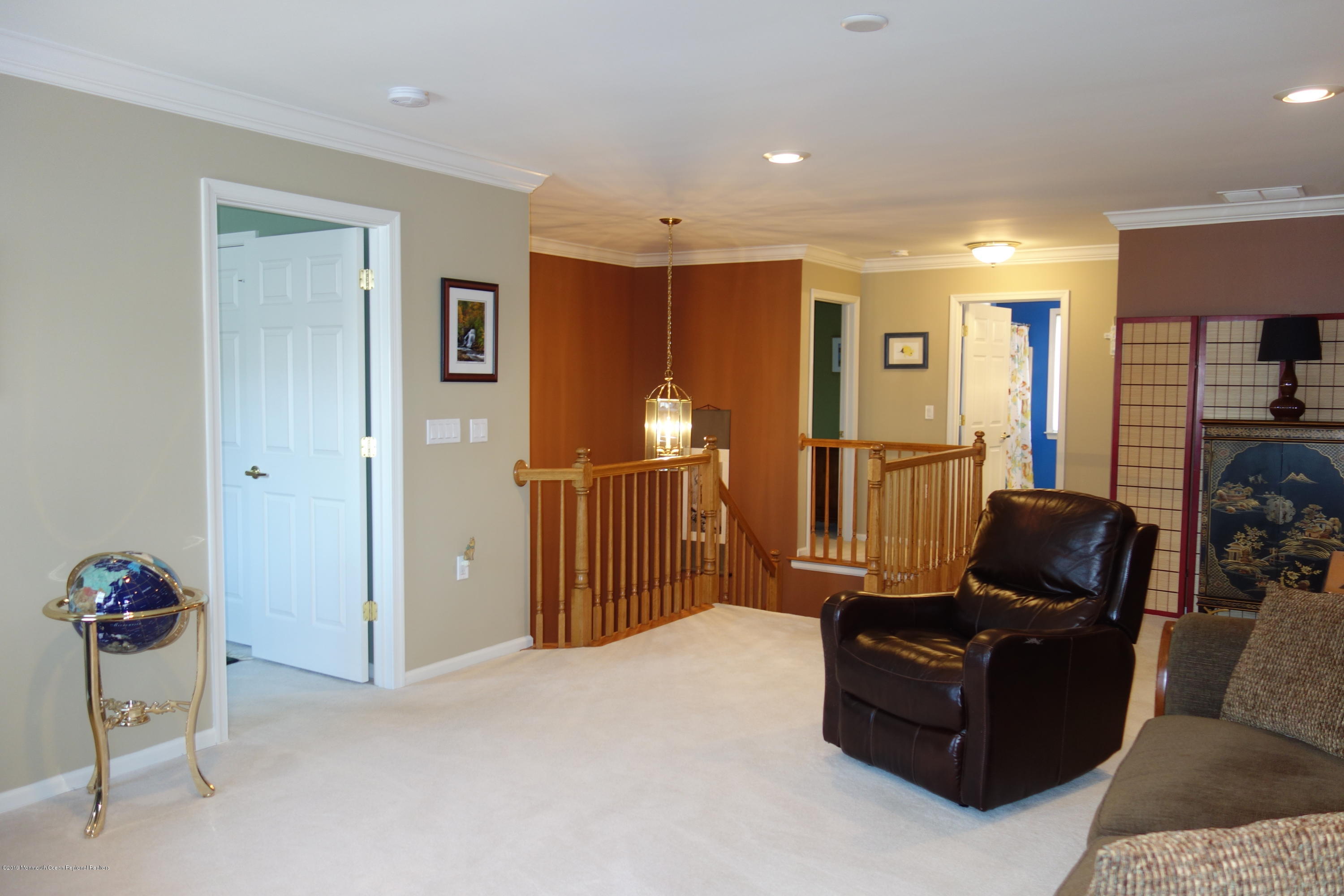 33 Pancoast Road Waretown, NJ 08758 - Photo 19 of 27 a living room with furniture and a flat screen tv