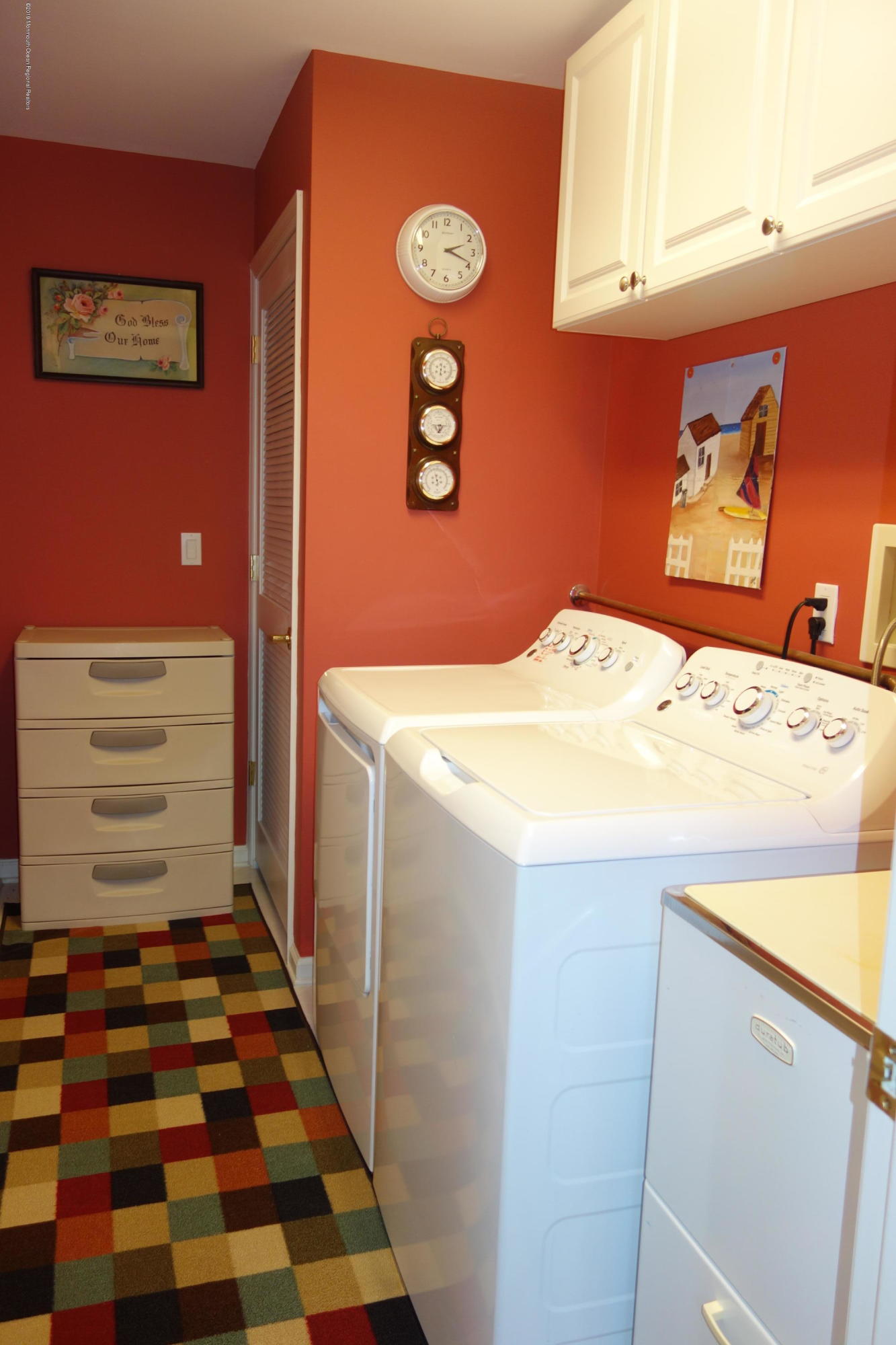 33 Pancoast Road Waretown, NJ 08758 - Photo 24 of 27 a utility room with a window dryer and washer