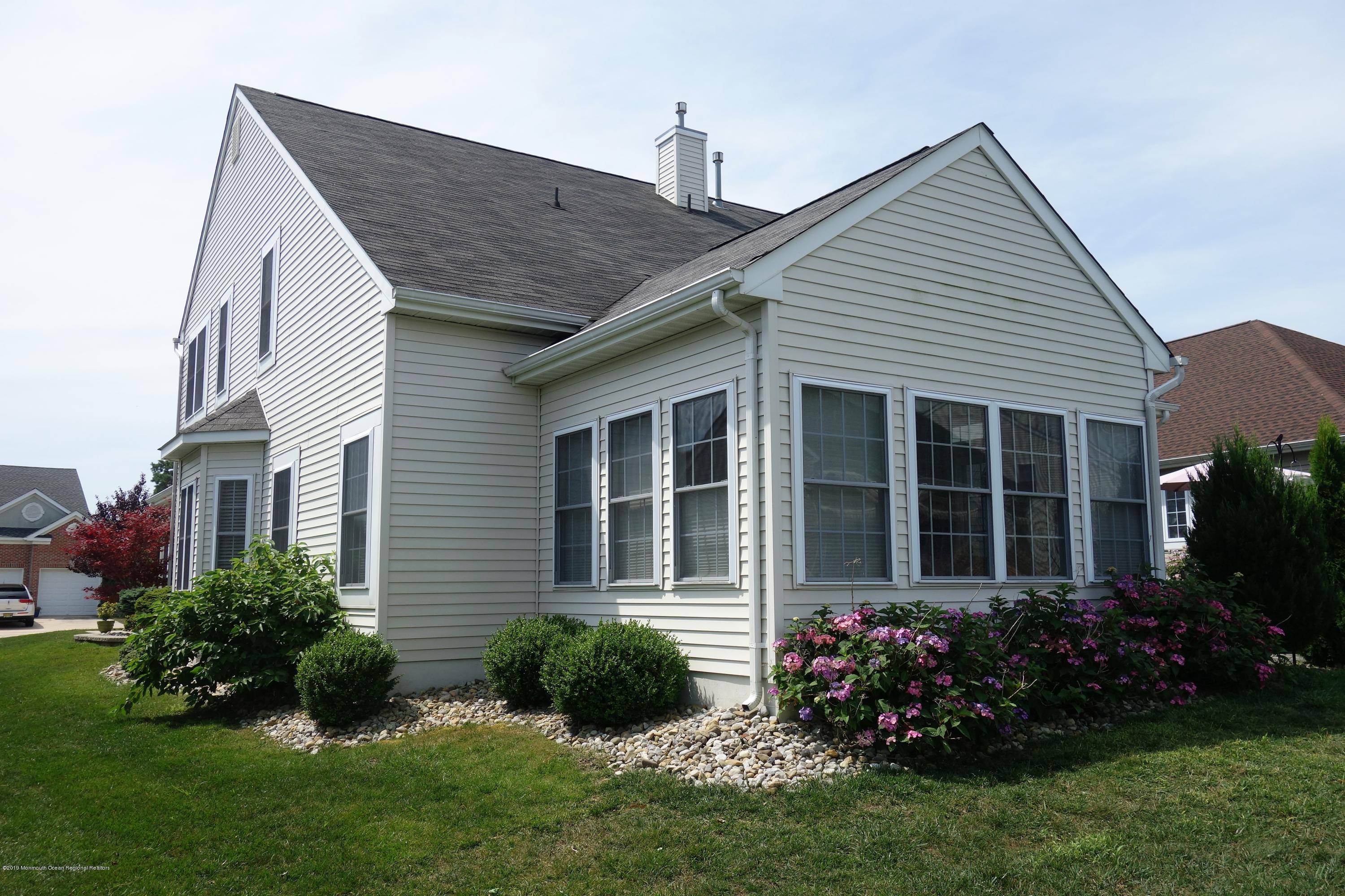33 Pancoast Road Waretown, NJ 08758 - Photo 27 of 27 a view of a house with garden and yard
