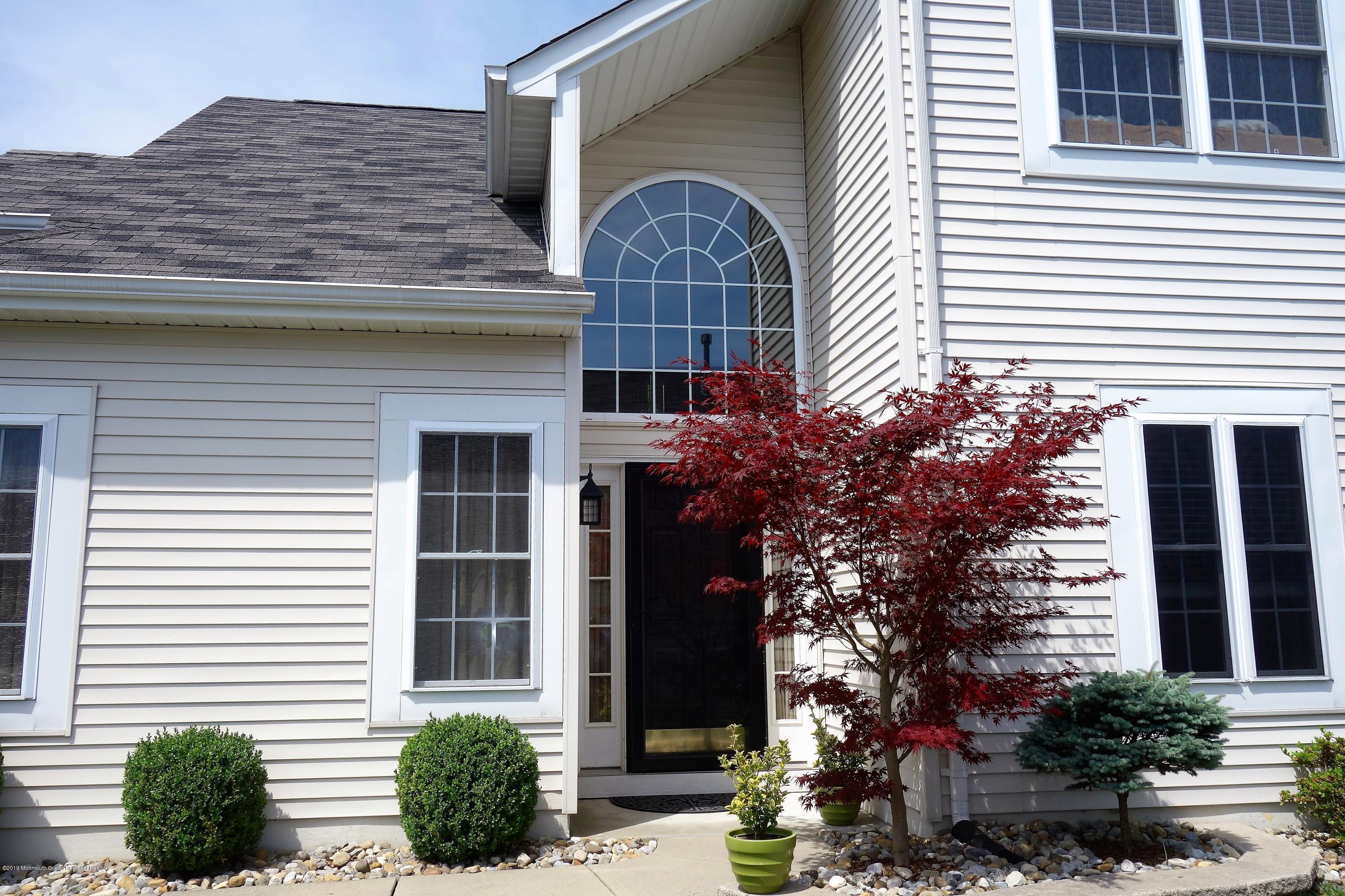 33 Pancoast Road Waretown, NJ 08758 - Photo 3 of 27 a front view of a house