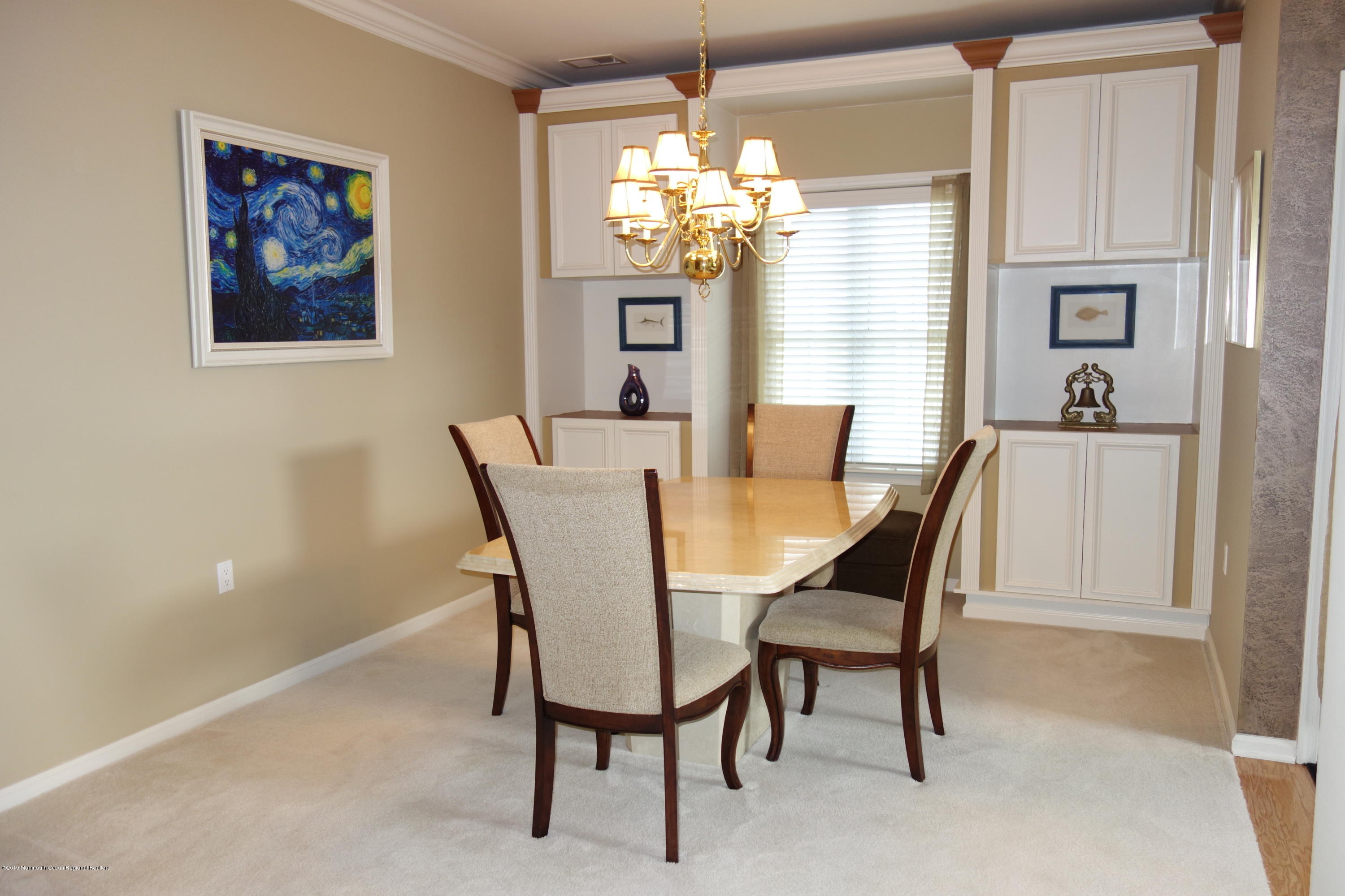 33 Pancoast Road Waretown, NJ 08758 - Photo 8 of 27 a view of a dining room with furniture and window