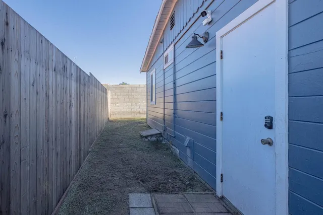 a view of a pathway of a wooden building