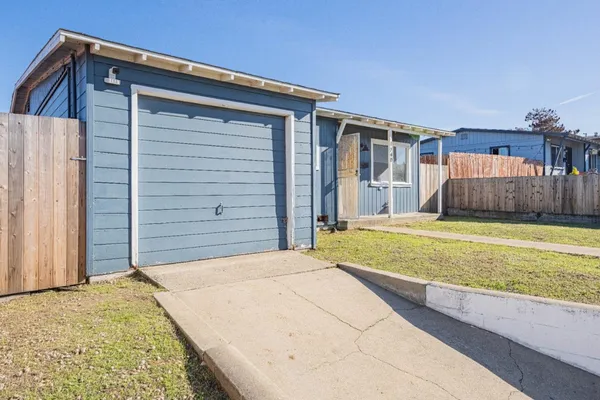 a house view with a backyard space