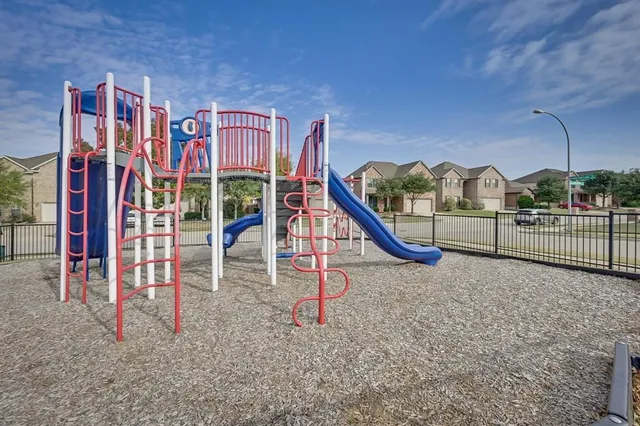 a view of a house with a park