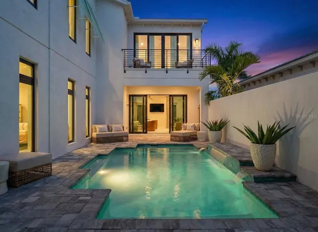 a view of a balcony with chairs