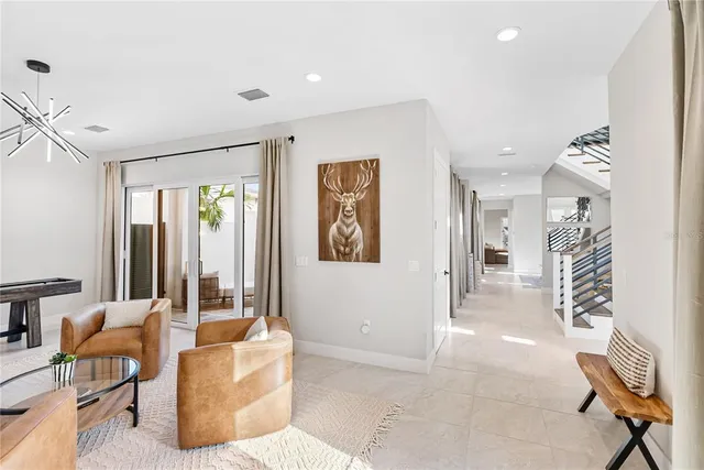 a view of yard from outdoor seating area