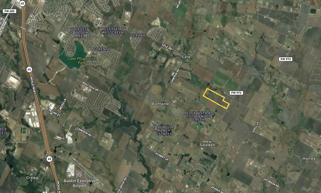 17618 Farm To Market Road 973 Coupland, TX 78615 - Photo 2 of 3 a view of a street with a tree