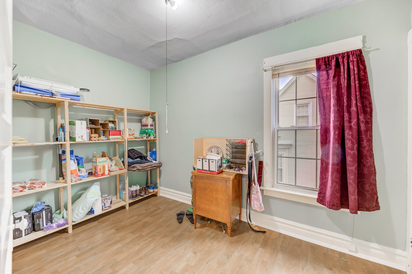 4018 North Whipple Street Chicago, IL 60618 - Photo 11 of 25 a view of a bedroom with baby crib and toys