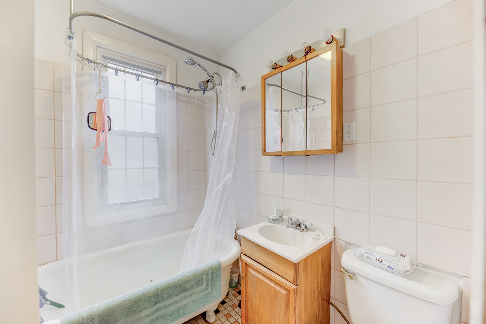 4018 North Whipple Street Chicago, IL 60618 - Photo 12 of 25 a bathroom with a sink toilet and shower