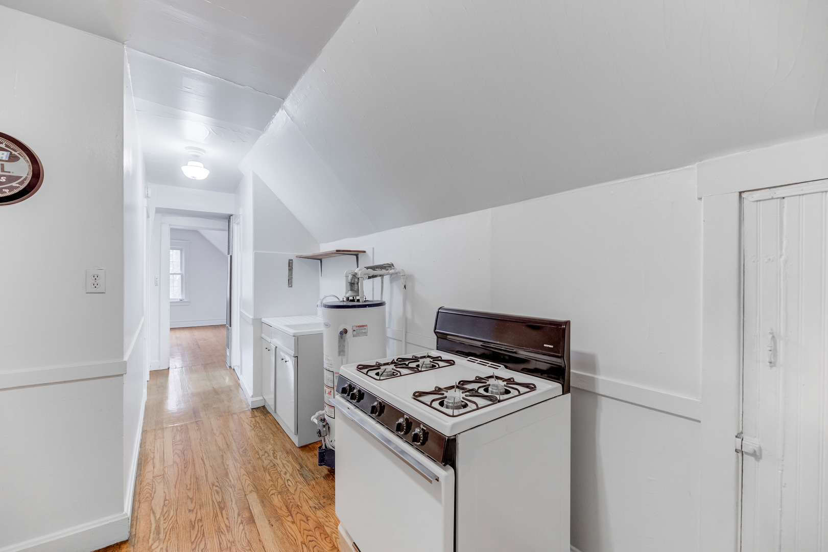 4018 North Whipple Street Chicago, IL 60618 - Photo 18 of 25 a kitchen with a stove and a refrigerator