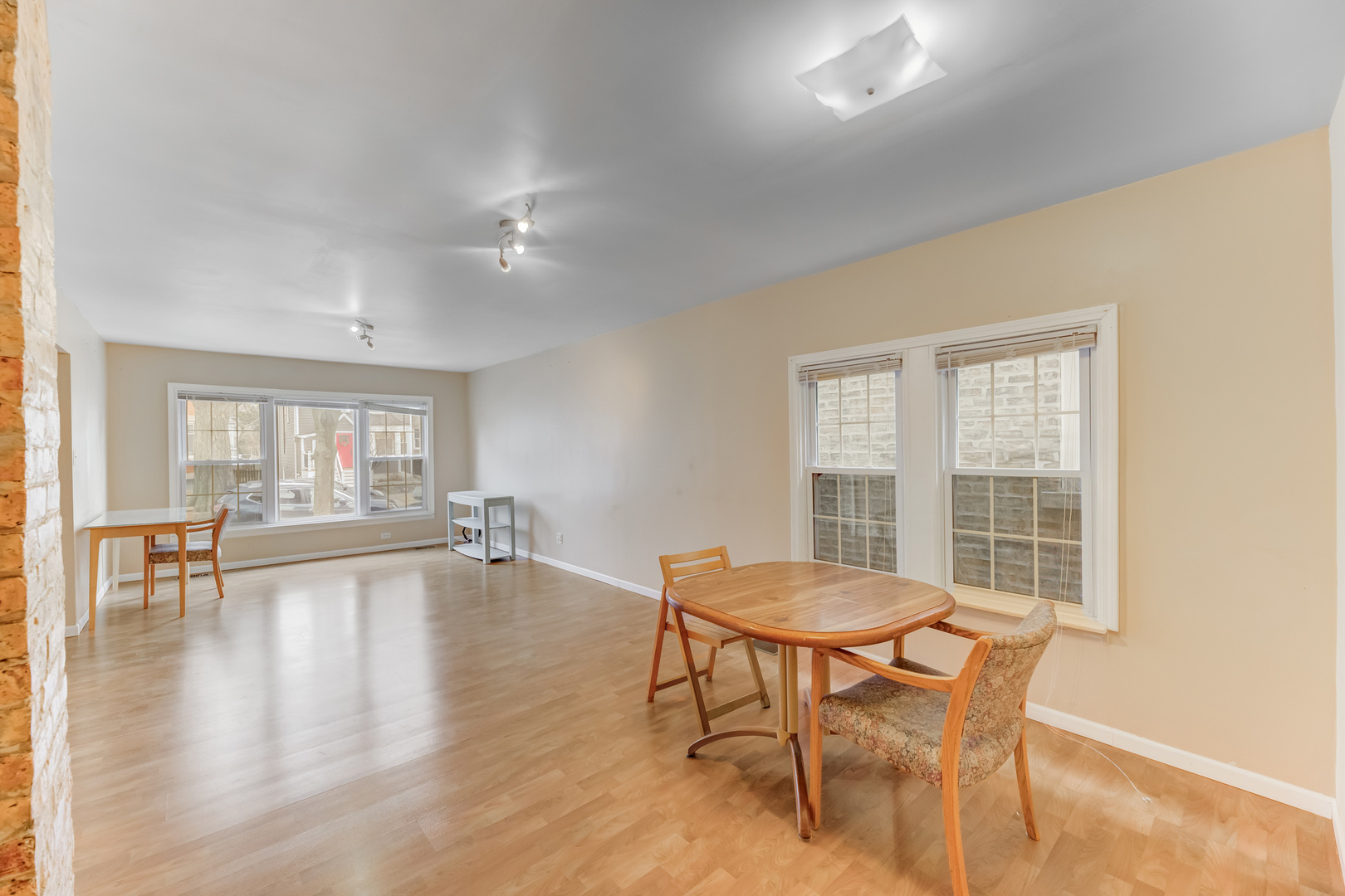 4018 North Whipple Street Chicago, IL 60618 - Photo 5 of 25 a view of a dining room with furniture and wooden floor