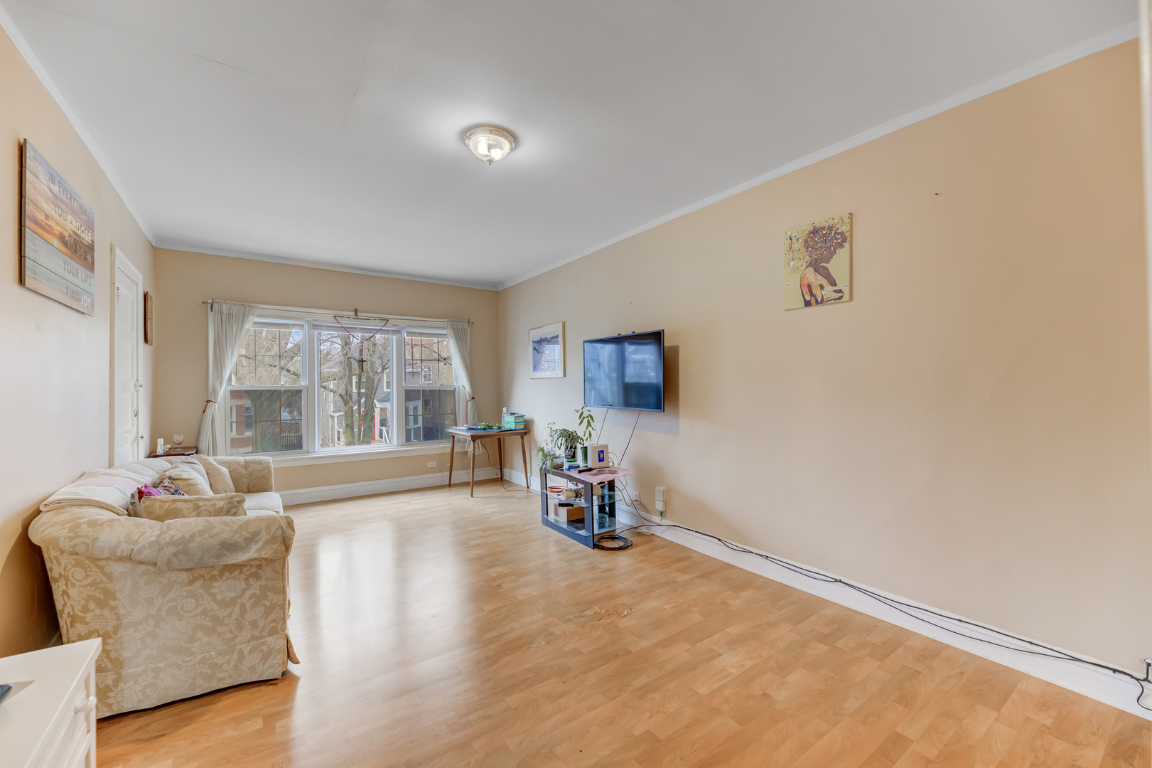 4018 North Whipple Street Chicago, IL 60618 - Photo 9 of 25 a living room with furniture and a large window