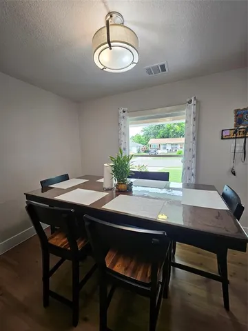 a table and chairs in a room