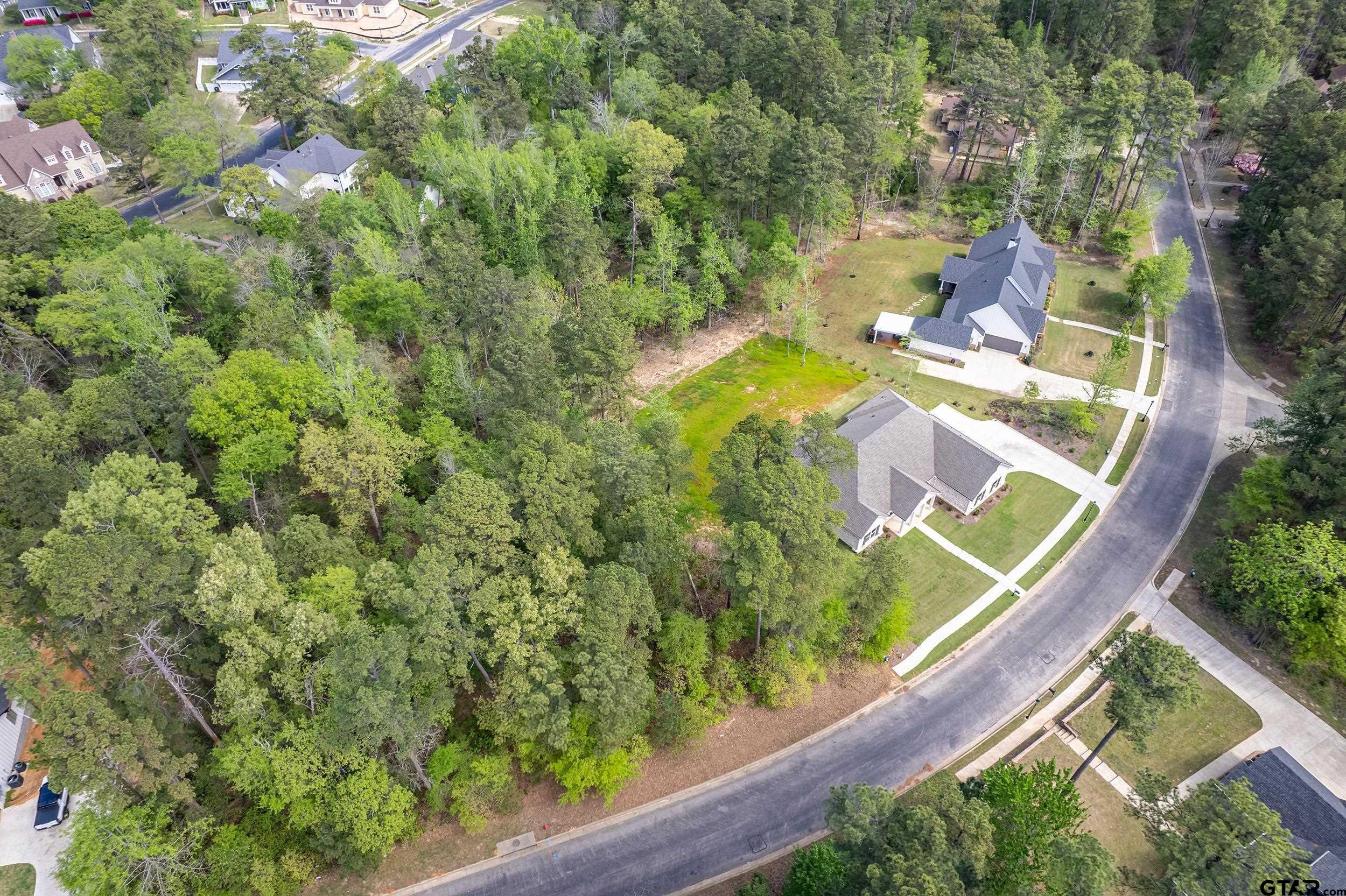 4028 Hanover Place Tyler, TX 75701 - Photo 12 of 16 an aerial view of a house with a yard