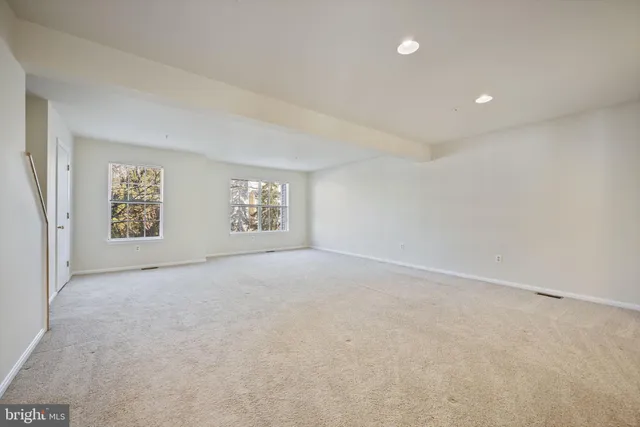 a view of a room with white walls