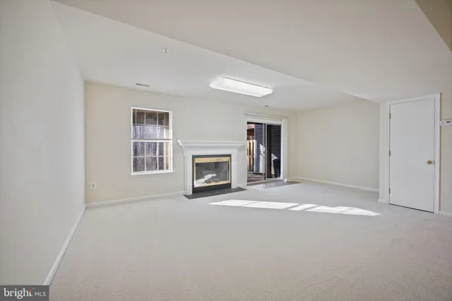 a view of balcony with wooden floor and fence