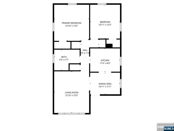 a picture of a bench in front of a wall