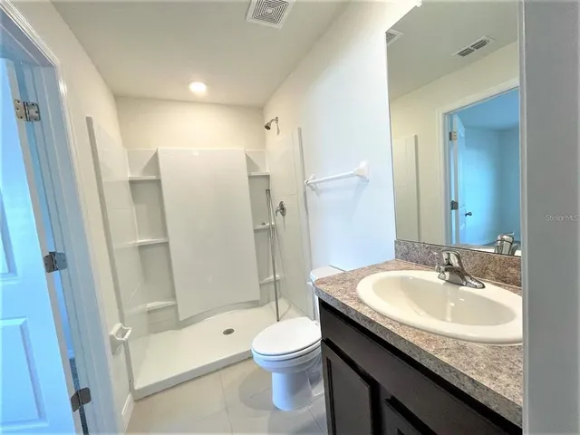 an outdoor space with furniture