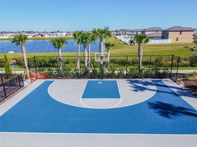a view of a patio with swimming pool