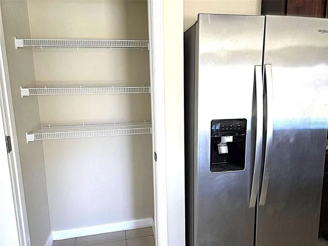 a kitchen with a sink and a window