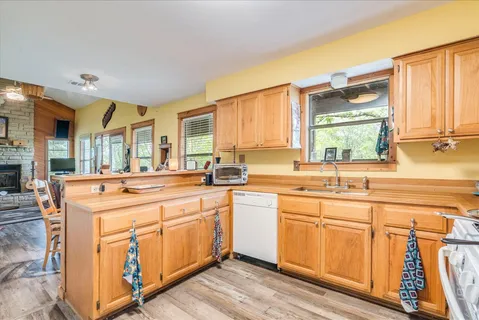 a kitchen with a sink and cabinets