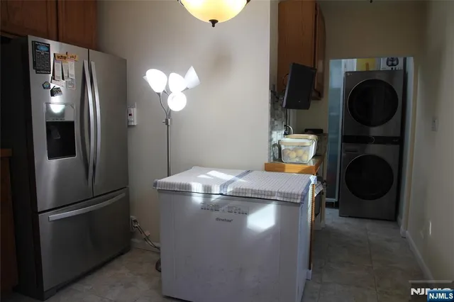 a room with a window and wooden floor