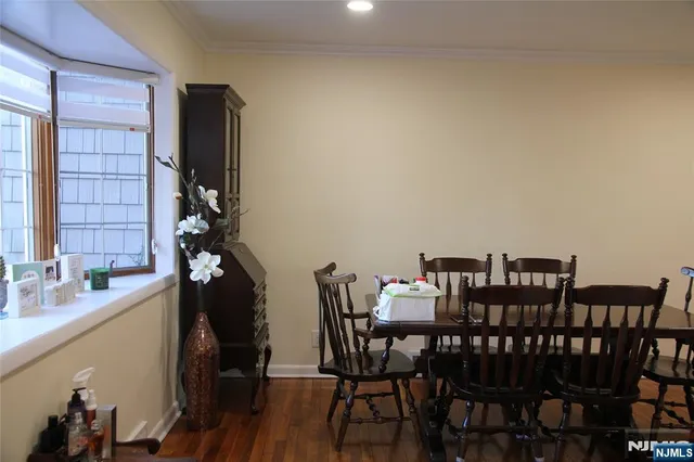 a kitchen with a large window and a couch