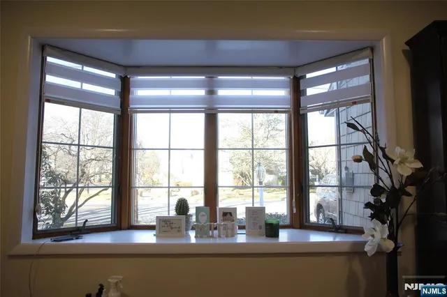 a living room with hard wood flooring and a couch