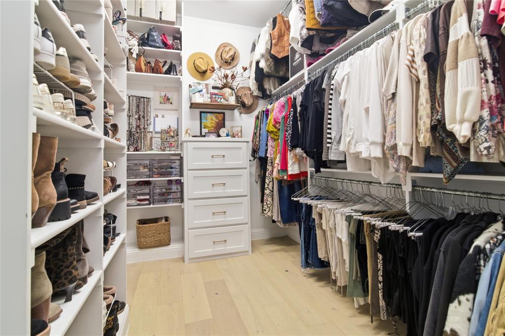 1920 Lotus Court Haslet, TX 76052 - Photo 18 of 40 One of 2 primary closets, oversized, built in dressers, this closet has direct access into the laundry room.