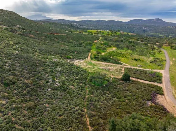 a view of mountain view with mountains in the background