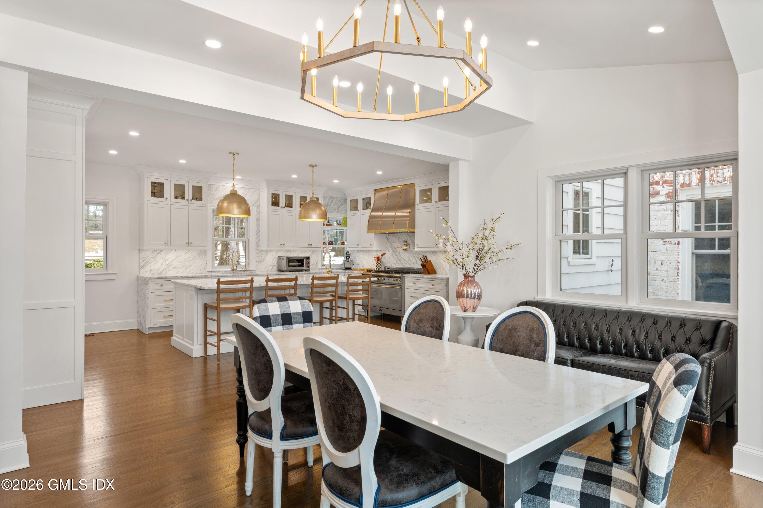 530 Round Hill Road Greenwich, CT 06831 - Photo 13 of 63 a view of a dining room with furniture window and wooden floor