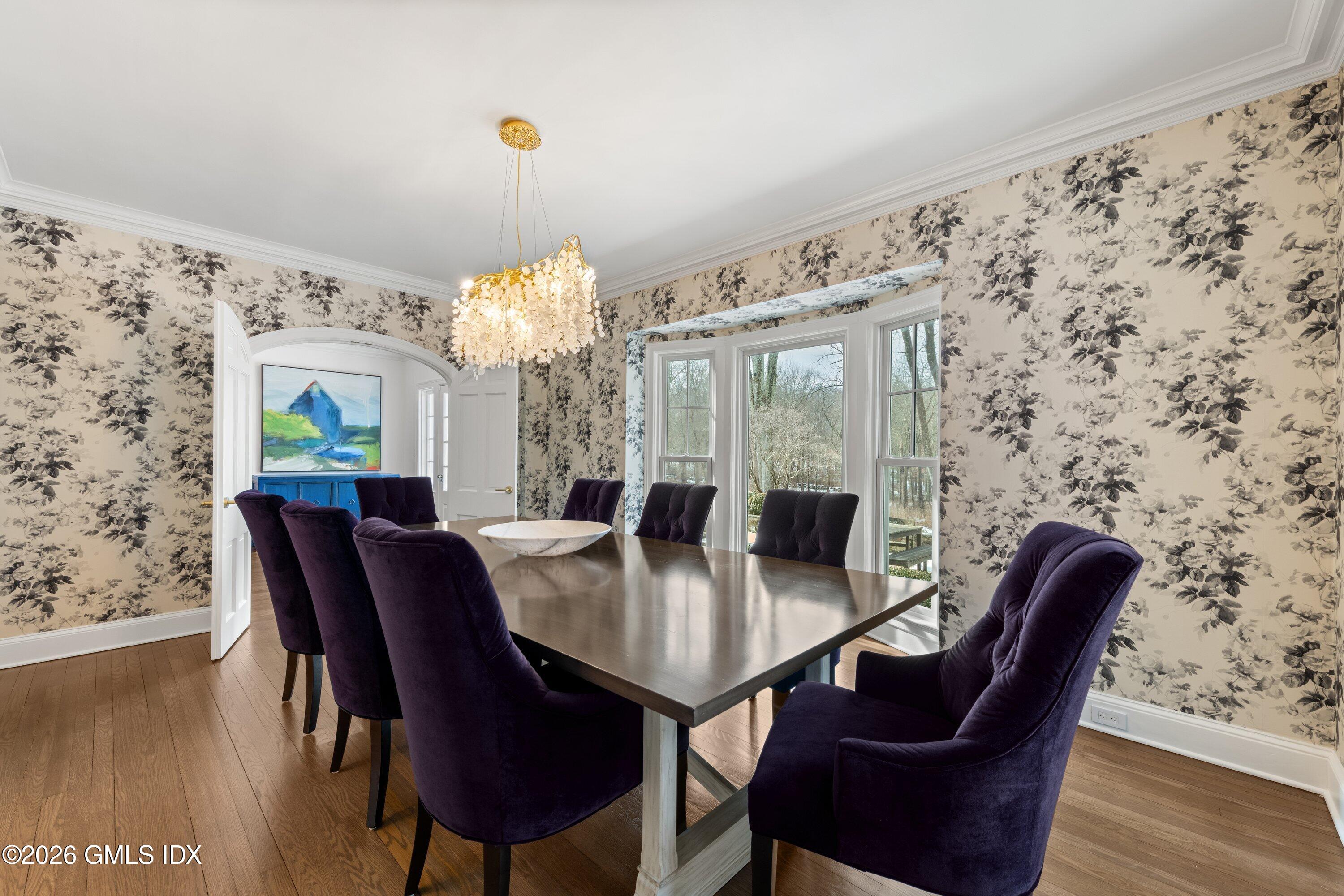 530 Round Hill Road Greenwich, CT 06831 - Photo 16 of 63 a view of a dining room with furniture and wooden floor