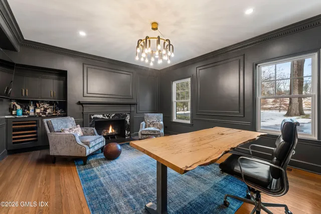 a bathroom with a granite countertop toilet sink and shower