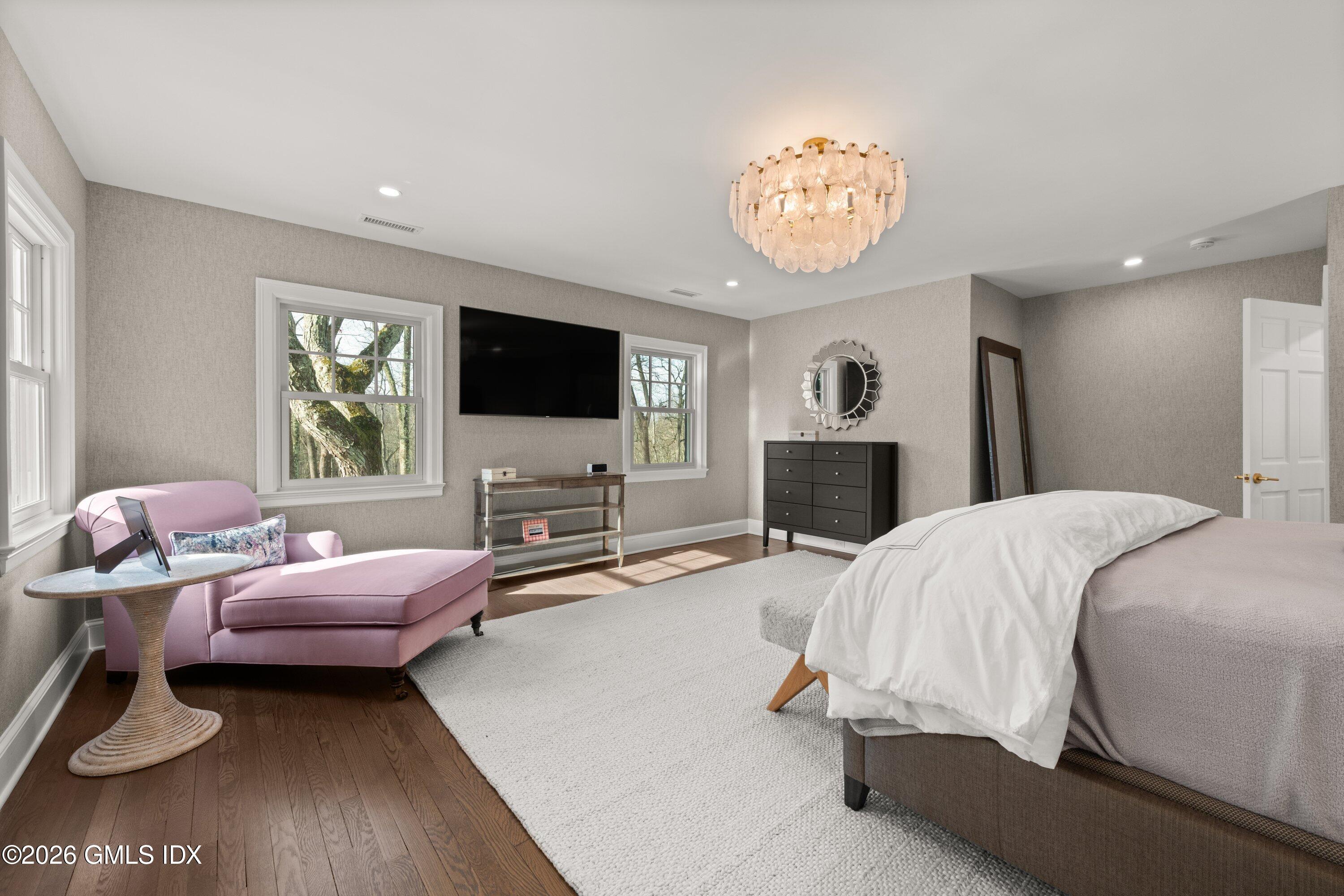 530 Round Hill Road Greenwich, CT 06831 - Photo 26 of 63 a bedroom with a bed and a flat screen tv