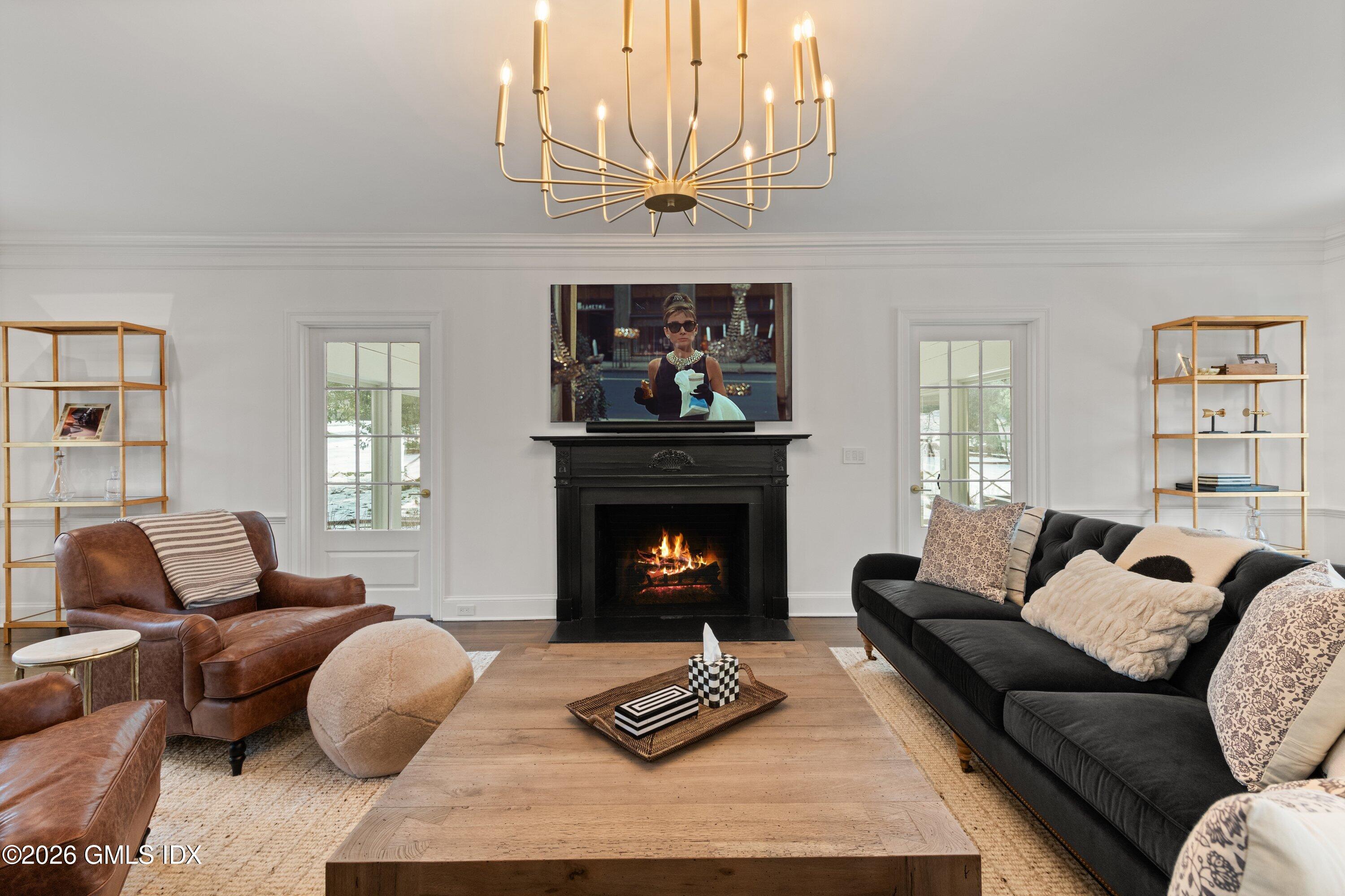 530 Round Hill Road Greenwich, CT 06831 - Photo 8 of 63 a living room with furniture and a fireplace