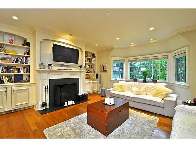 19 Terrace Avenue Riverside, CT 06878 - Photo 11 of 25 a living room with fireplace furniture and a flat screen tv