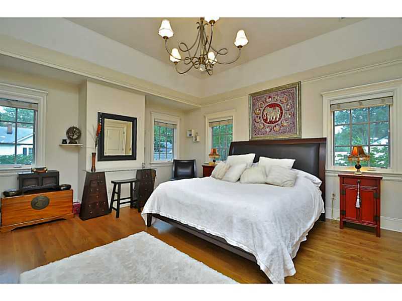 19 Terrace Avenue Riverside, CT 06878 - Photo 14 of 25 a bedroom with a bed and dresser with chair