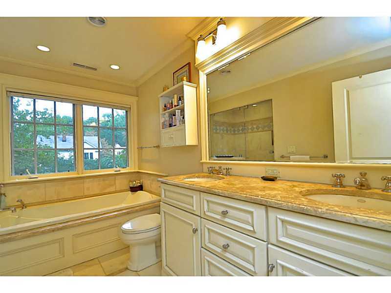 19 Terrace Avenue Riverside, CT 06878 - Photo 15 of 25 a bathroom with a granite countertop sink mirror vanity and bathtub