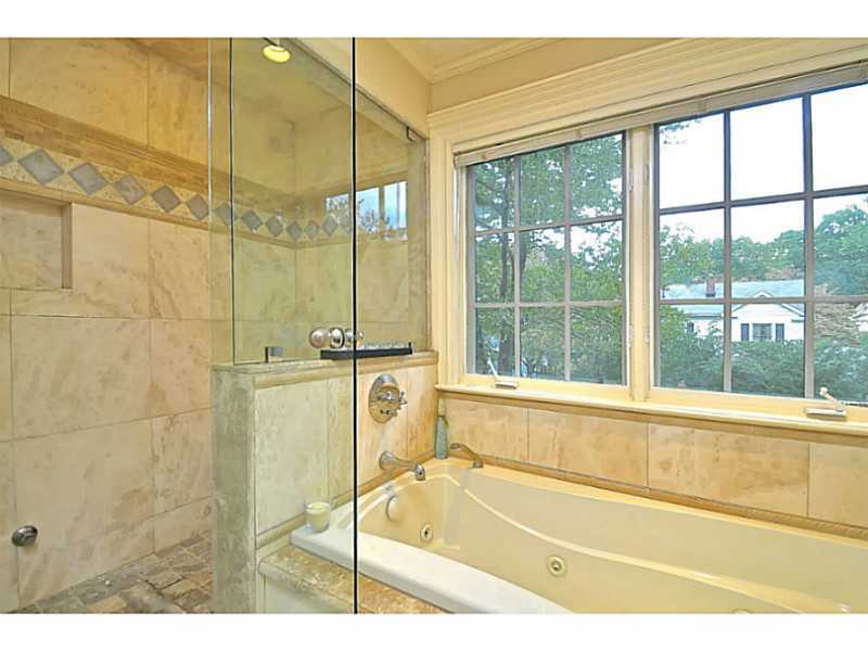 19 Terrace Avenue Riverside, CT 06878 - Photo 16 of 25 a bathroom with a bathtub and a shower