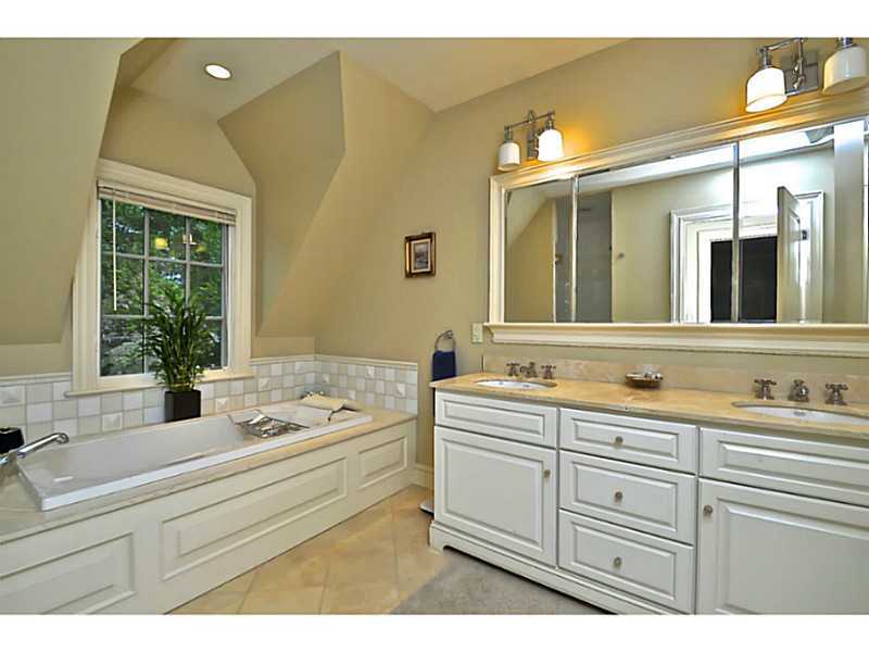 19 Terrace Avenue Riverside, CT 06878 - Photo 18 of 25 a bathroom with a sink and a mirror