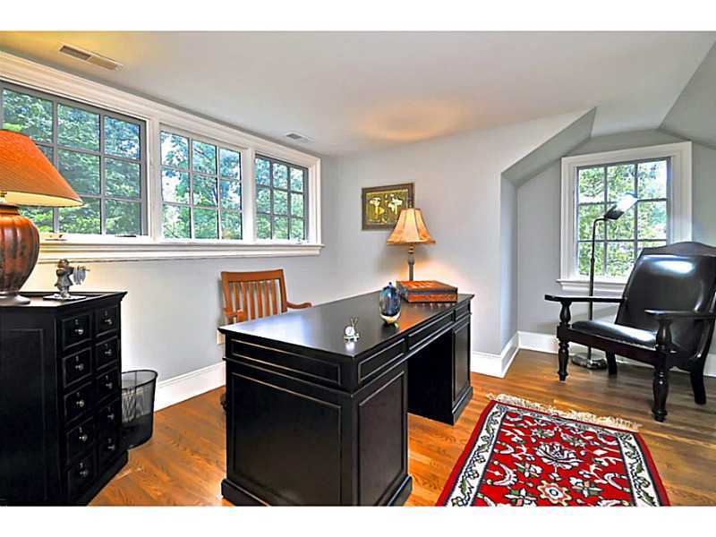 19 Terrace Avenue Riverside, CT 06878 - Photo 19 of 25 a living room with furniture and a flat screen tv